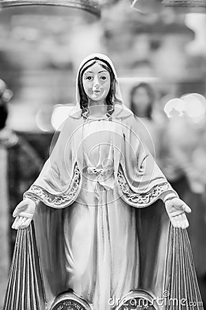 Figurine of the Virgin Mary with open arms Stock Photo