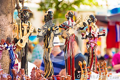 Figurines Cuban musicians. Close-up. Blurred background. Editorial Stock Photo