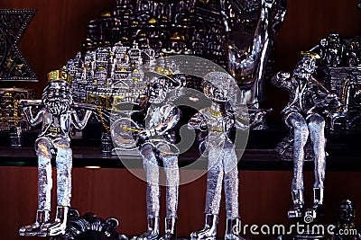 Figurines - toys Jews. Silver and gold souvenirs on the market in Jerusalem, Israel. Stock Photo