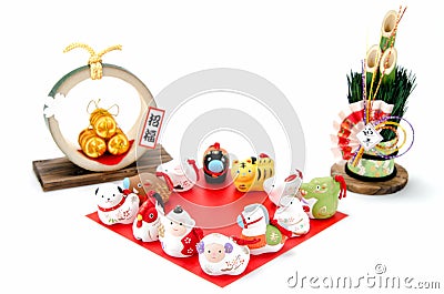Figurines of the zodiac and New Year's pine and Three golden str Stock Photo