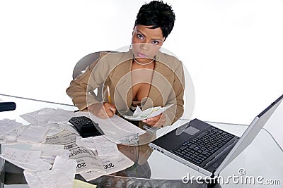 Figuring out her taxes Stock Photo