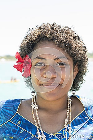 Fijian woman with Hibiscus Bloom Editorial Stock Photo