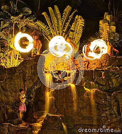 Fijian Firedancers on waterfall Editorial Stock Photo