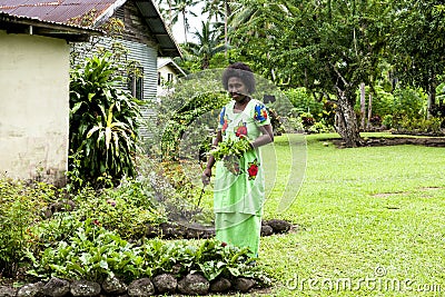 Fijian Woman in garden Editorial Stock Photo