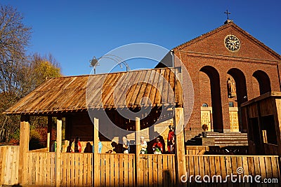 Fijnaart. Netherlands culture and belief in church . In a Christmas atmosphere with nativity scene and Christmas tree. Stock Photo