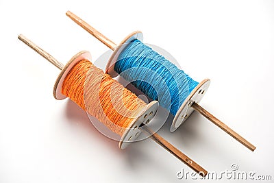 Fikri /Reel/Chakri /Spool with colourful thread or manjha or manja for Kite flying Stock Photo