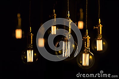 Filament lamps on black. Stock Photo