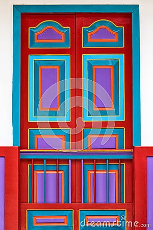 Building door painted in bright colors in Filandia, Colombia Editorial Stock Photo