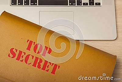 File with confidential data on the corporate desk, top view Stock Photo