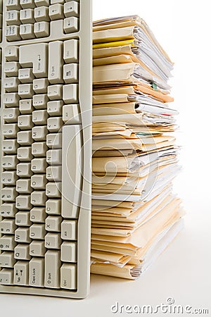 File Stack and Computer Keyboard Stock Photo