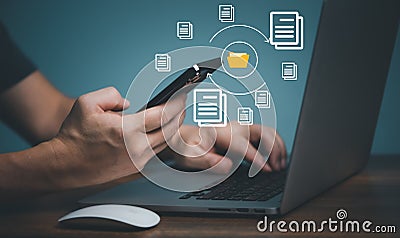 Files Transfer technology. User using Mobile Phone connection between Smart phone and computer Stock Photo