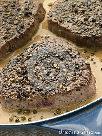 Filet Mignon au Poirve' in a saut pan Stock Photo