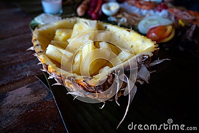 Filipino authentic traditional dish: philippine stuffed pinapple on a table, closeup Stock Photo