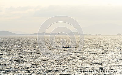 Filipino Banca boats being drenched by a midday rain Stock Photo