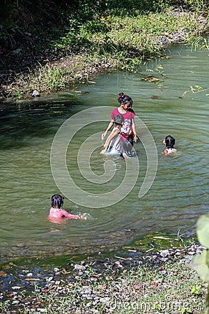 Filipino Children in a river Editorial Stock Photo