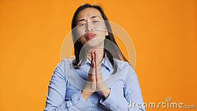 Filipino model praying for forgiveness and showing gratitude Stock Photo