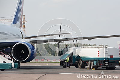 Fill up of an airplane Stock Photo