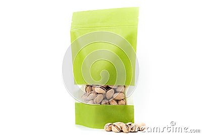 Filled green paper biodegradable doy pack flexible packaging with window and zipper on white background Stock Photo
