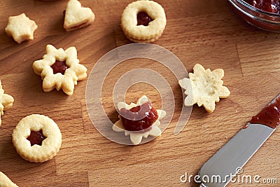 Filling Linzer Christmas cookies strawberry jam Stock Photo
