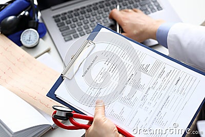 Filling out patient medical history, personal data Stock Photo
