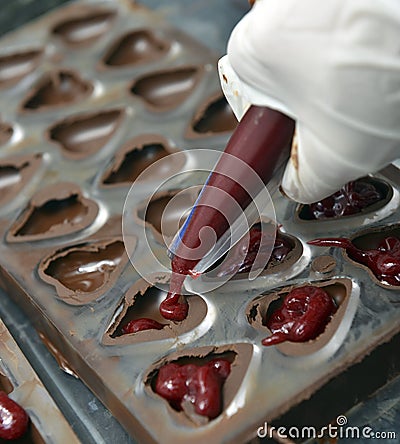 Filling pralines Stock Photo