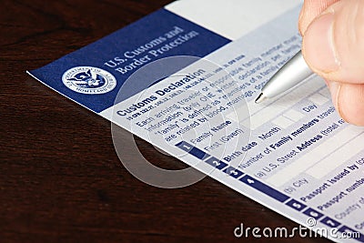 Filling up US customs and border protection form Editorial Stock Photo