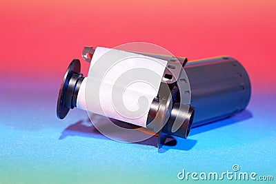 Film of an analogue camera with colorful background photographed in the studio Stock Photo
