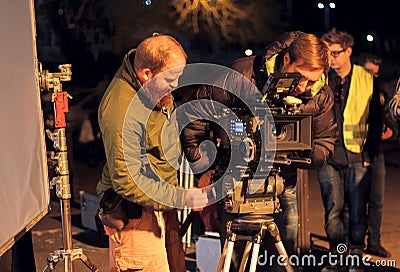 Film Crew Night Shoot. Cinematographer With 4k Arri Alexa Camera Editorial Stock Photo