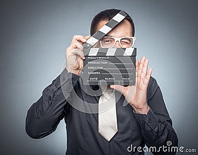 Film director with movir clapper board Stock Photo