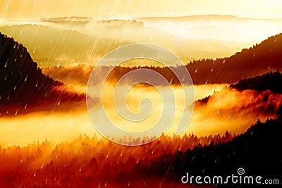 Film effect. Pink daybreak in hilly landcape. Autumn misty morning in a beautiful hills. Peaks of hills Stock Photo