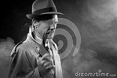 Film noir: detective in the dark with a gun Stock Photo