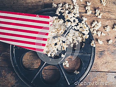 Film reel and popcorn Stock Photo