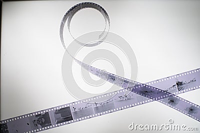 35mm film roll & lightbox, analog photography Stock Photo