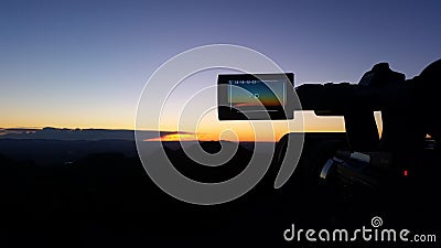 Filming Camera Viewing Mountain Sunrise Stock Photo