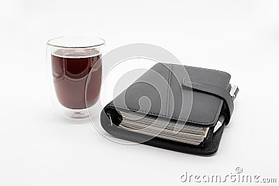 Filofax and coffee, on white background Stock Photo