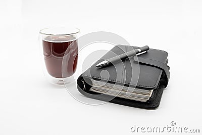 Filofax and coffee, isolated on white background Stock Photo