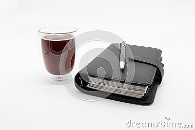 Filofax and coffee, isolated on white background Stock Photo