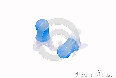 Filtered earplugs for airplane flying that help to equalize the pressure against your eardrum Stock Photo