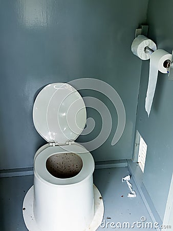 Filthy camp ground latrine outhouse inside toilet Stock Photo