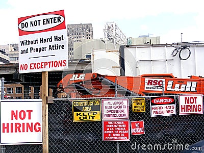 Finacial-Jobs-Not Hiring Signs at Construction Site Editorial Stock Photo