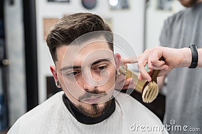 Making Male Haircut. Hair and beard care. Stock Photo