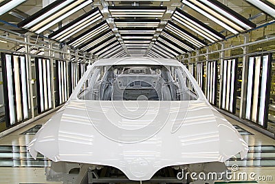 Final inspection of a car body in the paintshop Stock Photo