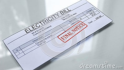 Final notice seal stamped on electricity bill, payment for services, tariff Stock Photo