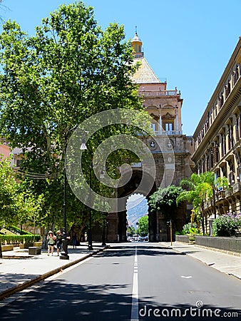 The final section of the Cassaro street and the Porta Nuova city gate in Palermo, Italy Editorial Stock Photo