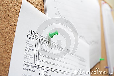 Finance concept with 1040 taxes forms Editorial Stock Photo