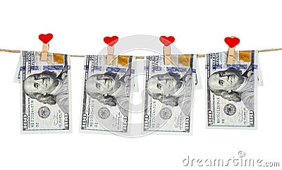Finance concept - dollar banknotes hanging on rope attached with love clothes pins Stock Photo