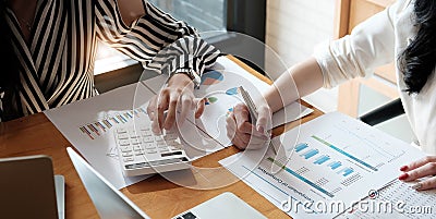 Financial advisory services. Group of business advisor showing plan of investment to clients in the consultancy office Stock Photo