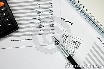 Financial analysis - income balance statement, business plan with glass Stock Photo