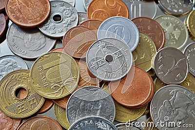 Financial background consisting of coins from many different countries in the metal box Stock Photo