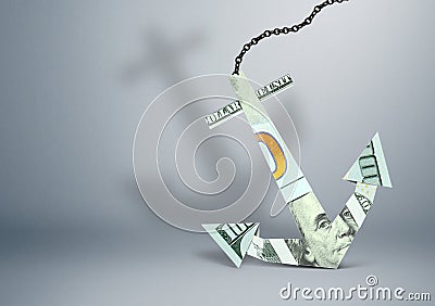 Financial burden concept, anchor made of money, copy space Stock Photo